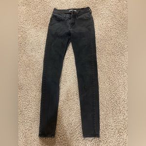 Levi’s 710 black skinny jeans